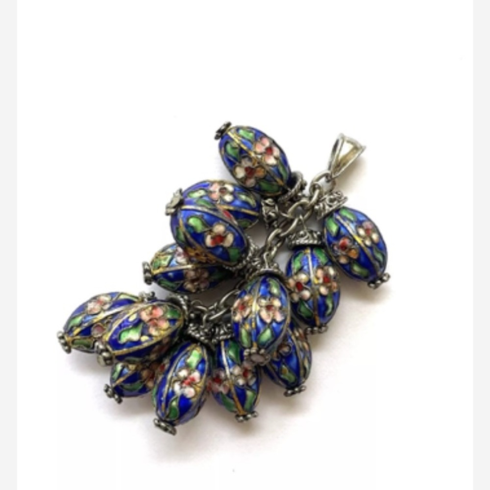 Russian 13 egg pendent in Russian silver